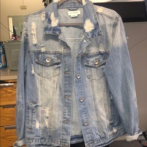 Light wash distressed denim jacket